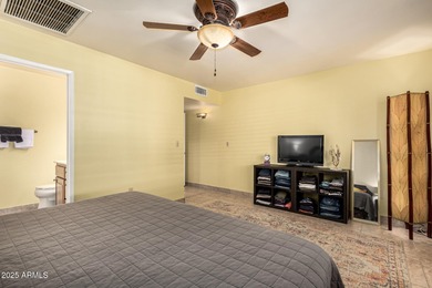 Huge lot. Swimming pool. Beautifully landscaped with grass. This on Sun City Country Club in Arizona - for sale on GolfHomes.com, golf home, golf lot