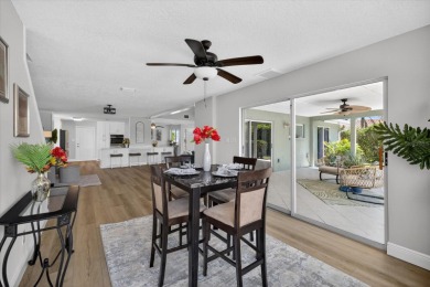 Picture yourself in a tropical oasis, where lush landscapes and on Gulf Harbors Golf Course in Florida - for sale on GolfHomes.com, golf home, golf lot