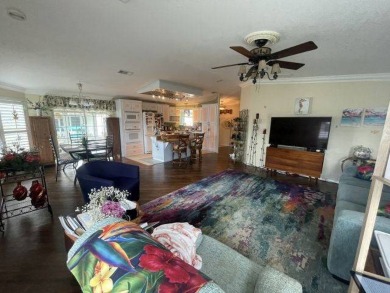 HUGE PRICE REDUCTION ~ SAVE $14,900! This spacious home offers on Four Lakes Golf Club in Florida - for sale on GolfHomes.com, golf home, golf lot
