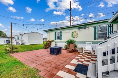 Situated on an oversized lot, this clean, bright, and move-in on Barefoot Resort and Golf Club  in South Carolina - for sale on GolfHomes.com, golf home, golf lot