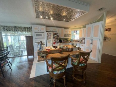 HUGE PRICE REDUCTION ~ SAVE $14,900! This spacious home offers on Four Lakes Golf Club in Florida - for sale on GolfHomes.com, golf home, golf lot