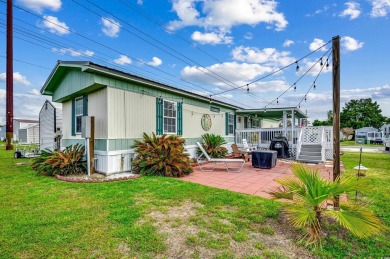Situated on an oversized lot, this clean, bright, and move-in on Barefoot Resort and Golf Club  in South Carolina - for sale on GolfHomes.com, golf home, golf lot