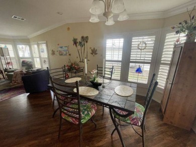 HUGE PRICE REDUCTION ~ SAVE $14,900! This spacious home offers on Four Lakes Golf Club in Florida - for sale on GolfHomes.com, golf home, golf lot
