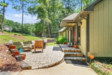 Welcome home to your private escape with your driveway Nestled on Lake Forest Yacht and Country Club in Alabama - for sale on GolfHomes.com, golf home, golf lot