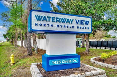Situated on an oversized lot, this clean, bright, and move-in on Barefoot Resort and Golf Club  in South Carolina - for sale on GolfHomes.com, golf home, golf lot