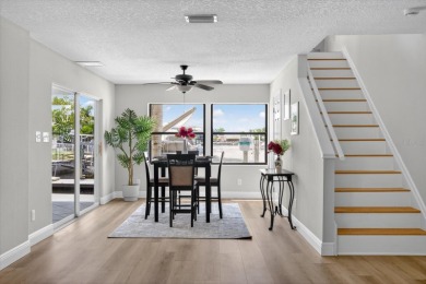 Picture yourself in a tropical oasis, where lush landscapes and on Gulf Harbors Golf Course in Florida - for sale on GolfHomes.com, golf home, golf lot
