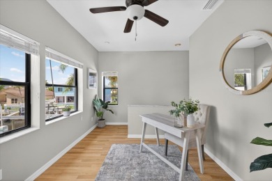 Picture yourself in a tropical oasis, where lush landscapes and on Gulf Harbors Golf Course in Florida - for sale on GolfHomes.com, golf home, golf lot