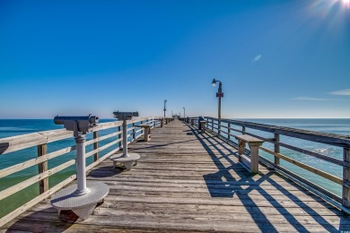 Situated on an oversized lot, this clean, bright, and move-in on Barefoot Resort and Golf Club  in South Carolina - for sale on GolfHomes.com, golf home, golf lot
