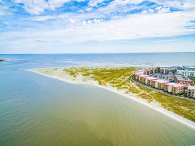 Situated on an oversized lot, this clean, bright, and move-in on Barefoot Resort and Golf Club  in South Carolina - for sale on GolfHomes.com, golf home, golf lot