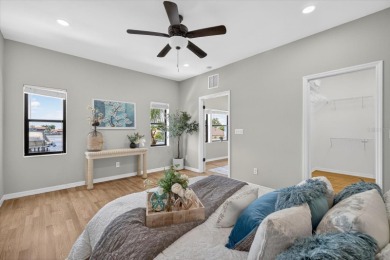 Picture yourself in a tropical oasis, where lush landscapes and on Gulf Harbors Golf Course in Florida - for sale on GolfHomes.com, golf home, golf lot