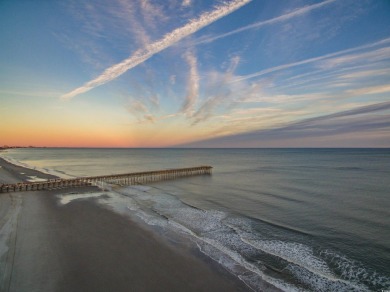 Situated on an oversized lot, this clean, bright, and move-in on Barefoot Resort and Golf Club  in South Carolina - for sale on GolfHomes.com, golf home, golf lot