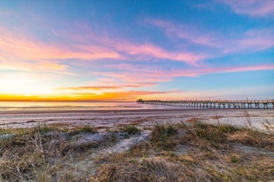 Situated on an oversized lot, this clean, bright, and move-in on Barefoot Resort and Golf Club  in South Carolina - for sale on GolfHomes.com, golf home, golf lot