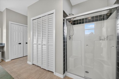 Picture yourself in a tropical oasis, where lush landscapes and on Gulf Harbors Golf Course in Florida - for sale on GolfHomes.com, golf home, golf lot