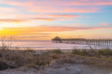Situated on an oversized lot, this clean, bright, and move-in on Barefoot Resort and Golf Club  in South Carolina - for sale on GolfHomes.com, golf home, golf lot