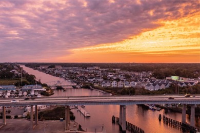 Situated on an oversized lot, this clean, bright, and move-in on Barefoot Resort and Golf Club  in South Carolina - for sale on GolfHomes.com, golf home, golf lot