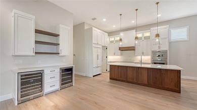 Built with exceptional craftsmanship, this Gary Stewart-designed on Laurel Oak Country Club in Florida - for sale on GolfHomes.com, golf home, golf lot