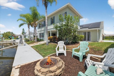 Picture yourself in a tropical oasis, where lush landscapes and on Gulf Harbors Golf Course in Florida - for sale on GolfHomes.com, golf home, golf lot