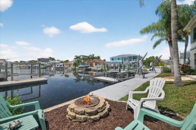 Picture yourself in a tropical oasis, where lush landscapes and on Gulf Harbors Golf Course in Florida - for sale on GolfHomes.com, golf home, golf lot