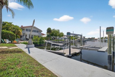 Picture yourself in a tropical oasis, where lush landscapes and on Gulf Harbors Golf Course in Florida - for sale on GolfHomes.com, golf home, golf lot