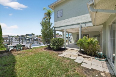 Picture yourself in a tropical oasis, where lush landscapes and on Gulf Harbors Golf Course in Florida - for sale on GolfHomes.com, golf home, golf lot