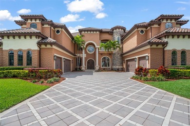 Welcome to a residence where the essence of lakeside opulence on Arnold Palmers Bay Hill Club and Lodge  in Florida - for sale on GolfHomes.com, golf home, golf lot