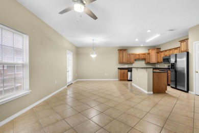 This beautifully appointed upscale townhome is ideally located on Fort Walton Beach Golf Course in Florida - for sale on GolfHomes.com, golf home, golf lot