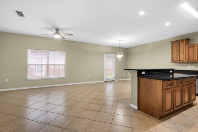 This beautifully appointed upscale townhome is ideally located on Fort Walton Beach Golf Course in Florida - for sale on GolfHomes.com, golf home, golf lot
