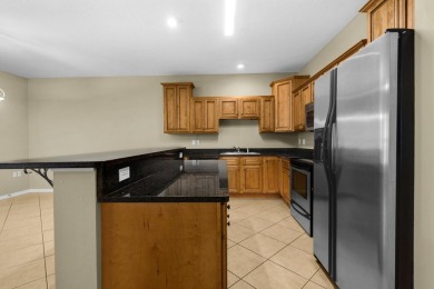This beautifully appointed upscale townhome is ideally located on Fort Walton Beach Golf Course in Florida - for sale on GolfHomes.com, golf home, golf lot