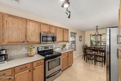 Immaculately maintained 4-bedroom, 2-bath home shows pride of on The Golf Club At Johnson Ranch in Arizona - for sale on GolfHomes.com, golf home, golf lot