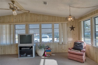 Short Sale. Welcome home to this unique single-wide manufactured on Orange Blossom Hills Golf and Country Club in Florida - for sale on GolfHomes.com, golf home, golf lot