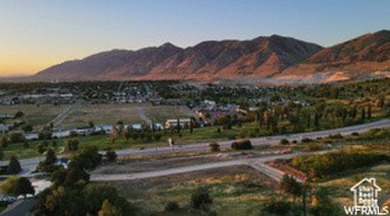 Unobstructed views of Brigham City, including the golf course on Eagle Mountain Golf Course in Utah - for sale on GolfHomes.com, golf home, golf lot