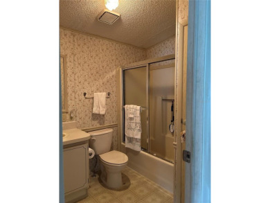 Double wide mobile home with 2 bedrooms, 2 Baths and 1040 sq ft on Orange Blossom Hills Golf and Country Club in Florida - for sale on GolfHomes.com, golf home, golf lot