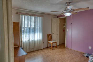 Short Sale. Welcome home to this unique single-wide manufactured on Orange Blossom Hills Golf and Country Club in Florida - for sale on GolfHomes.com, golf home, golf lot