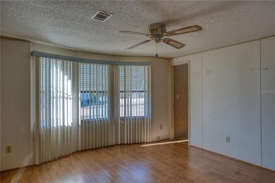 Short Sale. Welcome home to this unique single-wide manufactured on Orange Blossom Hills Golf and Country Club in Florida - for sale on GolfHomes.com, golf home, golf lot