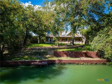 Welcome home to 302 Guadalupe River Drive, a custom waterfront on Golf Club of Seguin in Texas - for sale on GolfHomes.com, golf home, golf lot