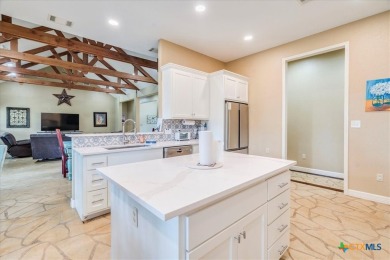 Welcome home to 302 Guadalupe River Drive, a custom waterfront on Golf Club of Seguin in Texas - for sale on GolfHomes.com, golf home, golf lot