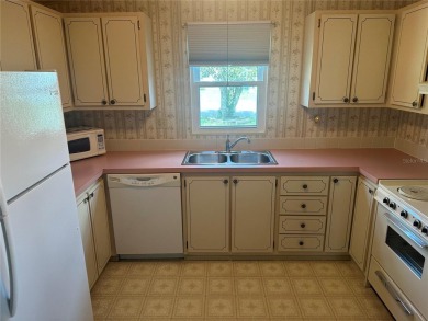 Double wide mobile home with 2 bedrooms, 2 Baths and 1040 sq ft on Orange Blossom Hills Golf and Country Club in Florida - for sale on GolfHomes.com, golf home, golf lot