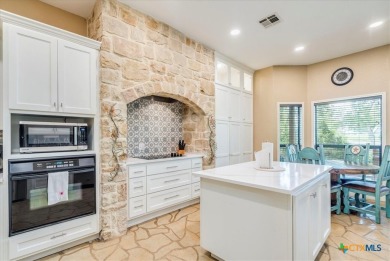 Welcome home to 302 Guadalupe River Drive, a custom waterfront on Golf Club of Seguin in Texas - for sale on GolfHomes.com, golf home, golf lot