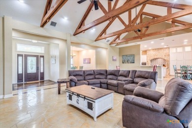 Welcome home to 302 Guadalupe River Drive, a custom waterfront on Golf Club of Seguin in Texas - for sale on GolfHomes.com, golf home, golf lot