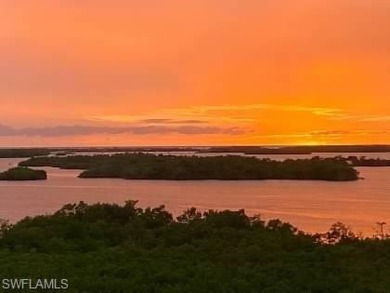 Breathtaking views and striking sunsets over Estero Bay and the on The Colony Golf and Country Club in Florida - for sale on GolfHomes.com, golf home, golf lot