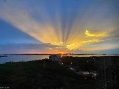 Breathtaking views and striking sunsets over Estero Bay and the on The Colony Golf and Country Club in Florida - for sale on GolfHomes.com, golf home, golf lot