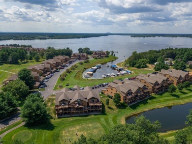 Stunning Furnished Condo on Castle Rock Lake! Discover luxury on Northern Bay Golf Resort and Marina in Wisconsin - for sale on GolfHomes.com, golf home, golf lot