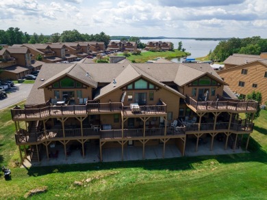 Stunning Furnished Condo on Castle Rock Lake! Discover luxury on Northern Bay Golf Resort and Marina in Wisconsin - for sale on GolfHomes.com, golf home, golf lot