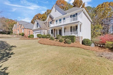 Beautiful traditional-style home with a rocking chair front on Canongate At Olde Atlanta Golf Club in Georgia - for sale on GolfHomes.com, golf home, golf lot