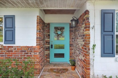 Welcome to this delightful 1950's gem, nestled right on the 12th on Temple Terrace Golf and Country Club in Florida - for sale on GolfHomes.com, golf home, golf lot