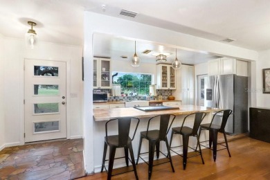 Welcome to this delightful 1950's gem, nestled right on the 12th on Temple Terrace Golf and Country Club in Florida - for sale on GolfHomes.com, golf home, golf lot
