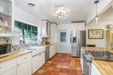 Welcome to this delightful 1950's gem, nestled right on the 12th on Temple Terrace Golf and Country Club in Florida - for sale on GolfHomes.com, golf home, golf lot