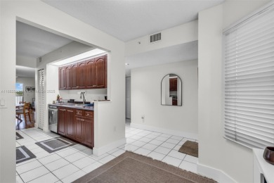 Million-dollar views from this impeccably maintained apartment on Flamingo Lakes Country Club in Florida - for sale on GolfHomes.com, golf home, golf lot