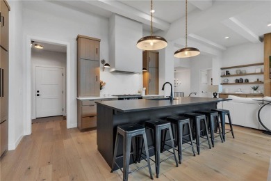 This incredible Werschay Homes masterpiece offers breathtaking on Blackberry Ridge Golf Club in Minnesota - for sale on GolfHomes.com, golf home, golf lot