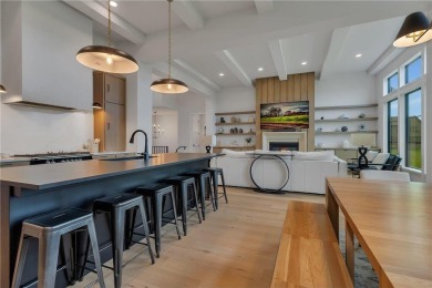 This incredible Werschay Homes masterpiece offers breathtaking on Blackberry Ridge Golf Club in Minnesota - for sale on GolfHomes.com, golf home, golf lot